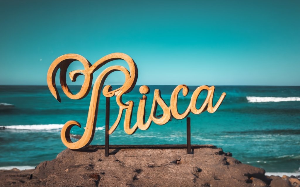 "Prisca" sign on the beach