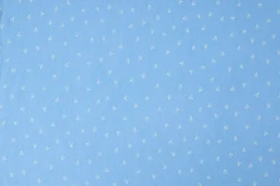 blue and white polka dot textile